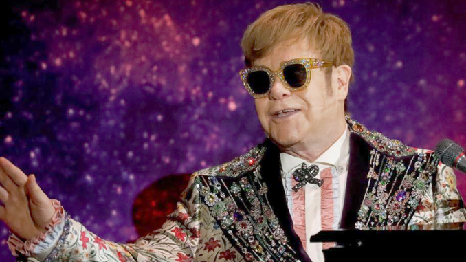 FILE-PHOTO-Singer-Elton-John-performs-before-announcing-his-final-Farewell-Yellow-Brick-Road-tour-in-Manhattan Elton John