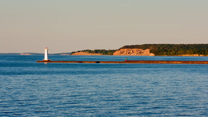 Sodus Point Beach Park in Sodus Point features a sandy lakefront, along with a walk on the lighthouse pier.